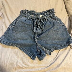 Worn maybe 3 times. Too short on me for my liking.